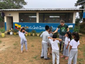 Volunteers run activities with school children