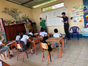 Volunteers teach English